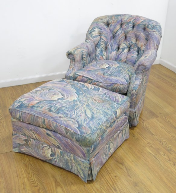 1950's upholstered arm chair and ottoman: Possibly by Tommi Parzinger. Approx. 32" H x 31" W x 30" D. Upholstery dirty.