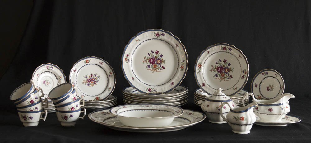 Booths Dinnerware Set: 8 dinner plates, 8 luncheon plates, 8 cake plates, 8 saucers, 8 cups, 1 oval platter, gravy boat, oval serving bowl, covered sugar bowl, and creamer.