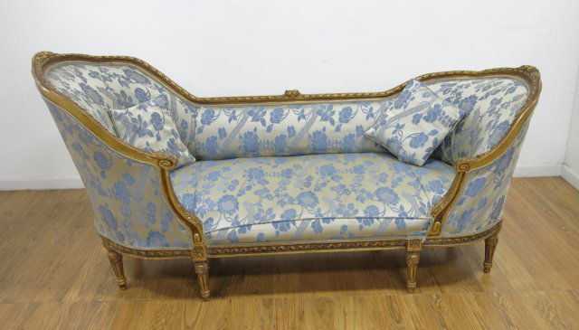 Heavily Carved Giltwood Chaise Longue: With two cushions.