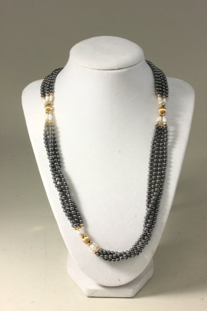 Hematite, Pearl, & Gold Bead Necklace: Quadruple strand. Hematite beads, fresh water pearls, and gold beads. Approx. 34" L.