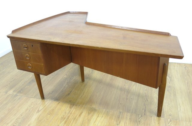 Arne Vodder Teak Desk: Approx. 30" H x 75" W x 42" D.