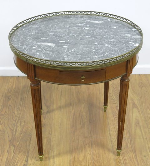 Louis XVI Style Marble Top Bouillotte Table: Brass pierced gallery. Approx. 27" H x 28" D.