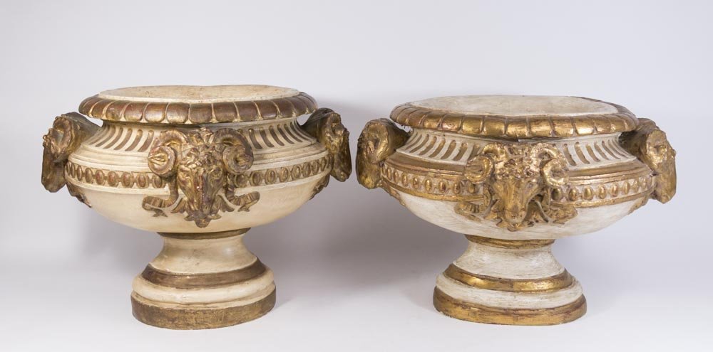 Pair of Gilt Decorated Plaster Planters: Ram's head decor. Approx. 16" H x 25" W x 18" D.