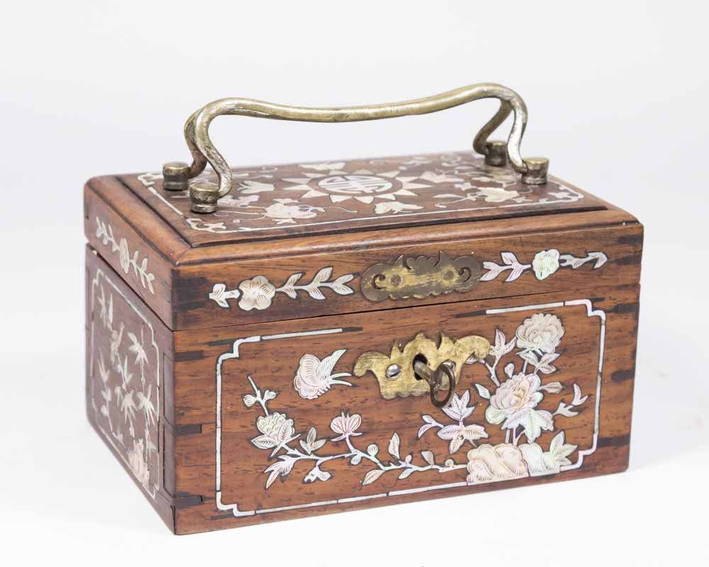 Chinese Jewelry Casket: Mother of pearl inlay. Approx. 3 1/2" H x 6 1/2" W x 4 1/2" D.