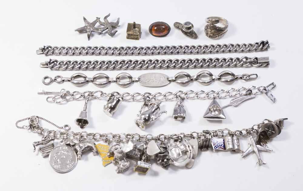 Lot of Sterling Silver Jewelry: Including pins, bracelets, charm bracelets, ring. Total weight approx. 5.46 ozt, 170 g. (5098)
