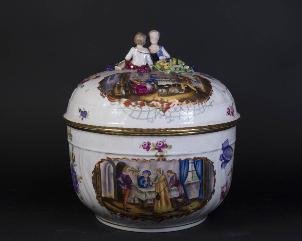 Carl Thieme German Porcelain Covered Tureen: Young boy and girl handle and floral decoration. Approx. 13 1/2" H x 10 1/2" D.