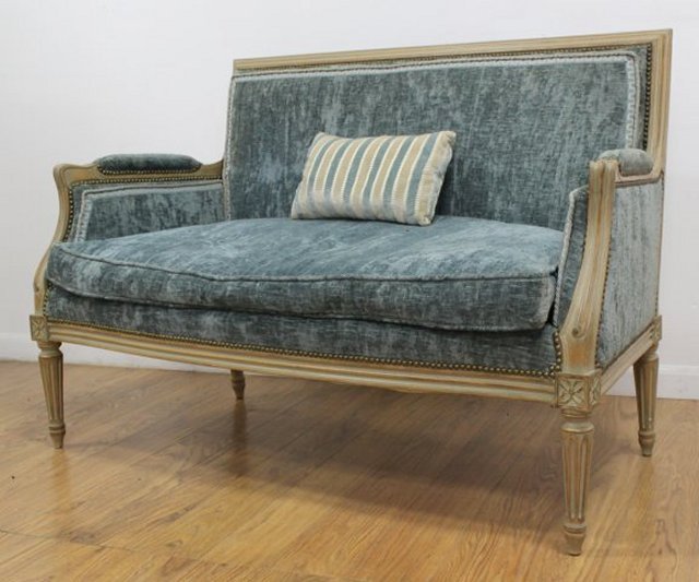 Louis XVI Style Loveseat: Blue upholstery. Approx. 34" H x 50" W x 23" D. Contents of a North Shore, Long Island home.