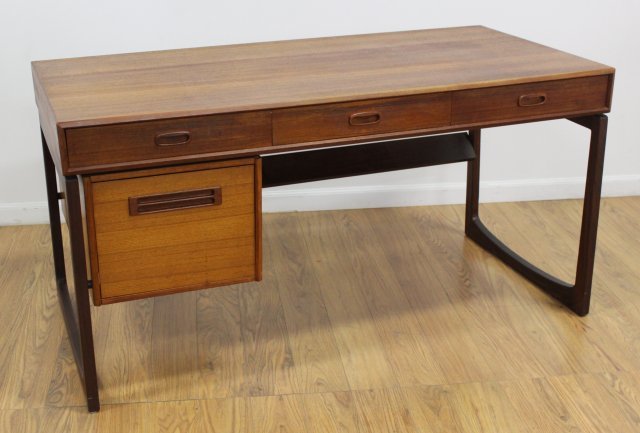 Danish Modern Teak Desk: Retailed by Maurice Villency. Approx. 28 3/4" H x 55 1/4" W x 26 3/4" D. (5120)