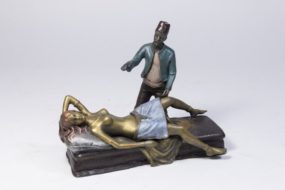 Reproduction Vienna Style Bronze: Arab man standing over reclining nude. Approx. 6" H x 7 1/2" L.