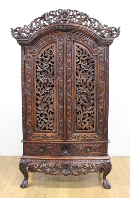 Indonesian Heavily Carved Armoire: From the personal collection of Law & Order actress Tamara Tunie.