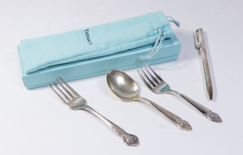 Tiffany & Co. Pen, Child's Forks & Spoon: Including Tiffany & Co. pen, Wolfenden child's fork and spoon, and odd sterling silver child's fork. (5175)