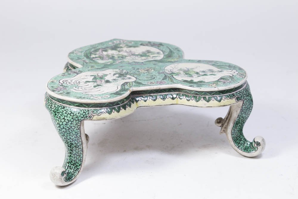 Chinese Porcelain Green Ground Trivet: Trefoil-form decorated with figures. Approx. 8 3/4" W. Property from the estate of Kurt Thomas. Repaired.