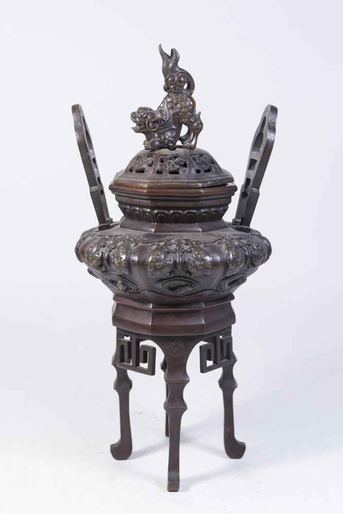 Chinese Bronze Incense Burner with Foo Dog Lid: Chocolate brown patina. Approx.14" H. Property from the estate of Kurt Thomas.