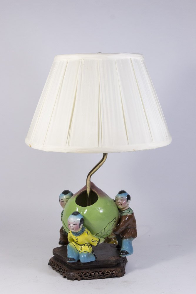 Chinese Porcelain Lamp with 3 Figures & Peach: Approx. 12" H. Property from the estate of Kurt Thomas.