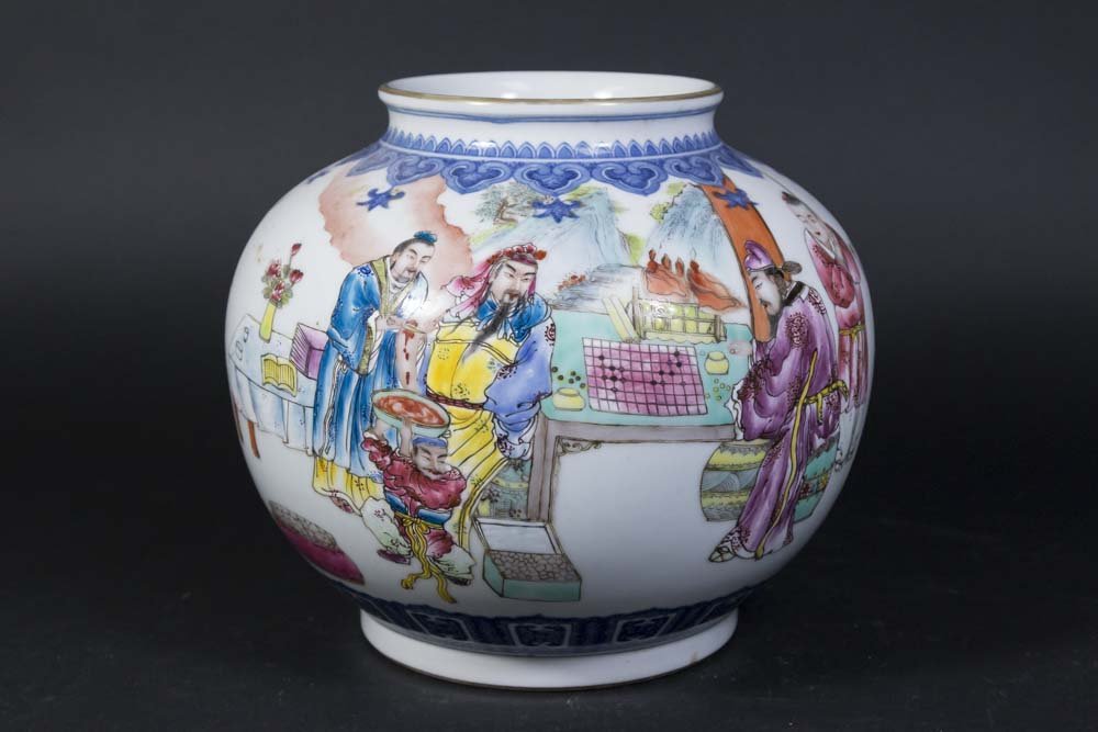 Chinese Porcelain White Ground Vase: Decorated with court scene. Approx. 8" H. Property from the estate of Kurt Thomas.