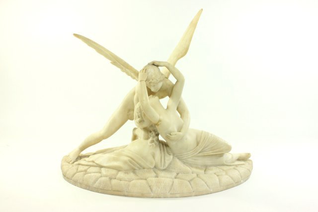 Alabaster Figural Grouping: Wings removable. Late 19th-early 20th century. Approx. 18" H x 24" W x 11" D. Crack in arm and wing.