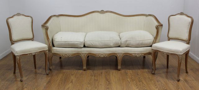 3-Piece Louis XV Style Bleached Beechwood Suite: Including a canape and pair of chaises. Upholstered in down-filled striped silk. Canape approx. 32 1/2" H x 75" W x 30" D. From the estate of Arthur Adlman, New York, NY and Cascais, Portugal. (5229)