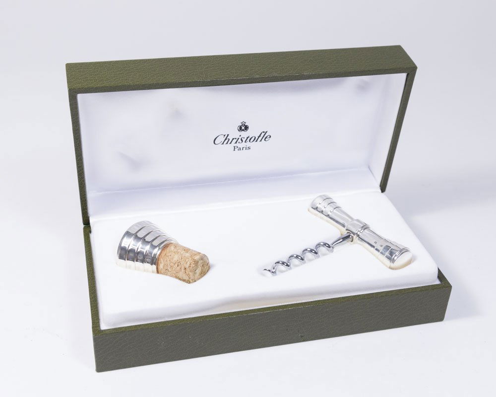 Christofle Silverplate Wine Set: Including tire-bouchon, bottle stopped, and corkscrew. In original green leather grain box.