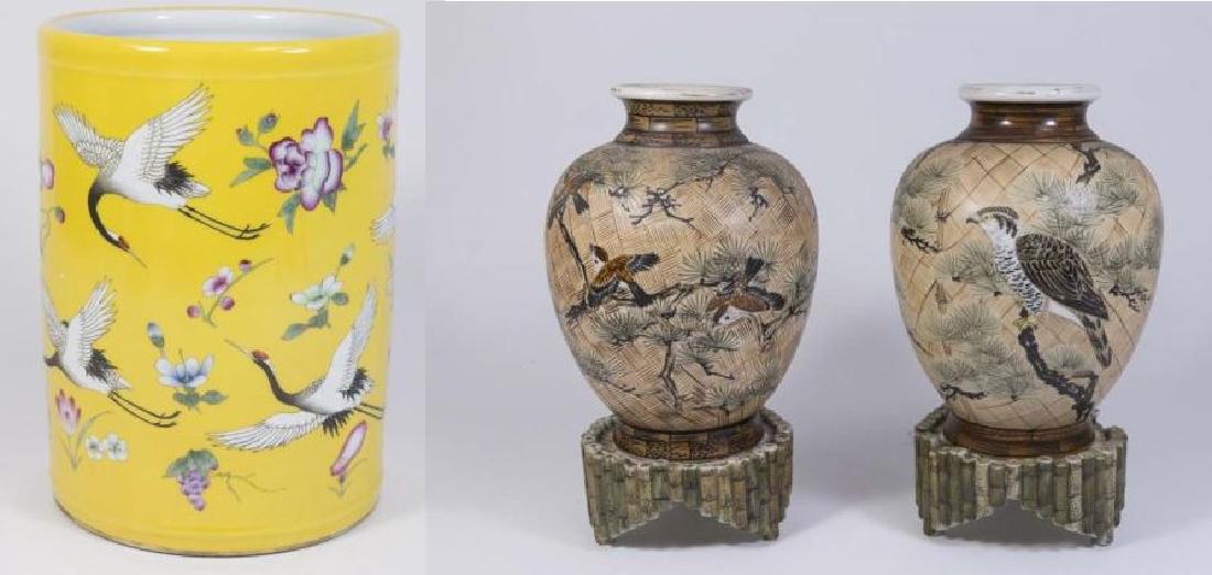 Chinese Jardiniere & Pair Japanese Vases: Chinese yellow ground porcelain jardiniere, decorated with cranes, approx. 9 3/4"; and pair Japanese porcelain vases on stands, approx. 11 1/4" H. Property from the estate of Kurt Thomas. 1 base of va