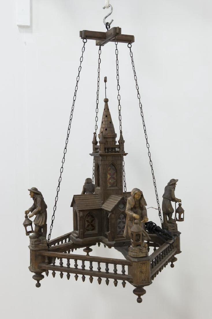 Gothic Revival Carved Mahogany Chandelier: Late 19th/early 20th century. Signed L. Jecouzo. Approx. 31" H x 18" W.