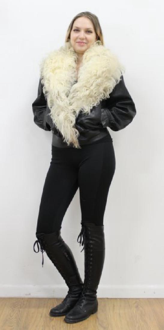 Saint Laurent Rive Gauche Vintage Leather Bomber: Made in Paris. With fur collar. Size 12. (5163) Good condition. Needs to be cleaned.