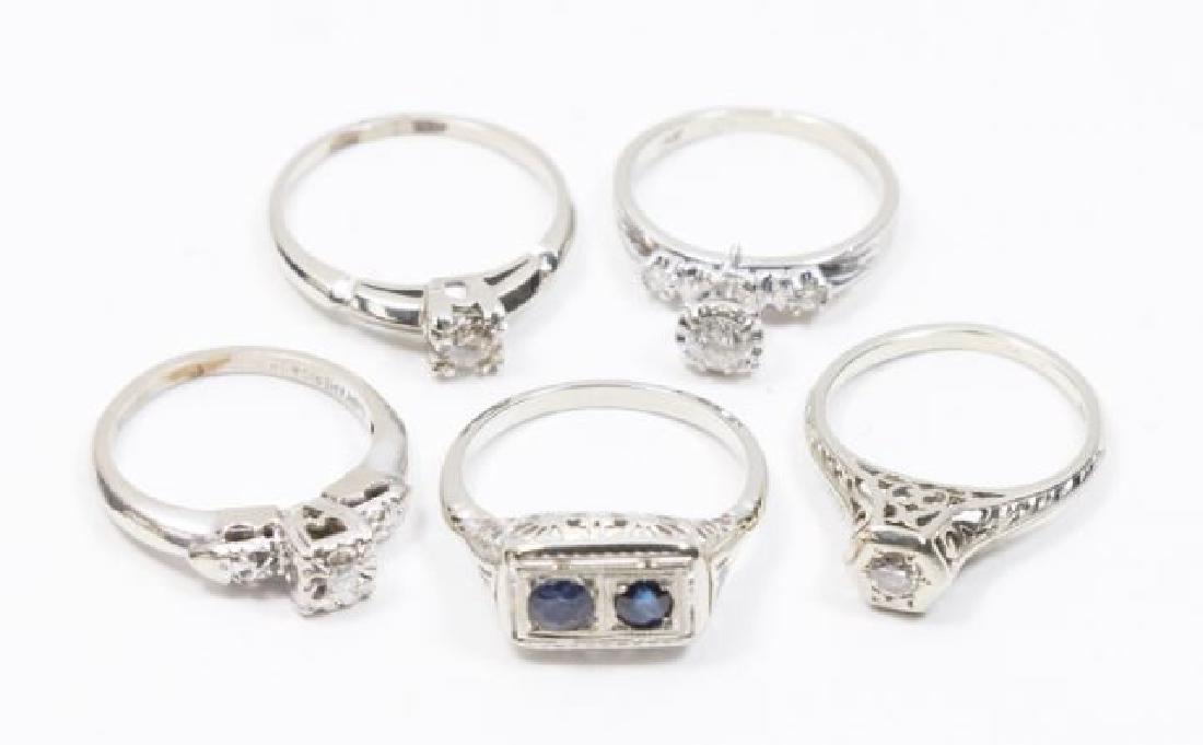 :Set 5 White Gold Ladies Rings: 4 with diamond, 1 with sapphires 14K white gold. Approx. 8.0 dwt. (5111)