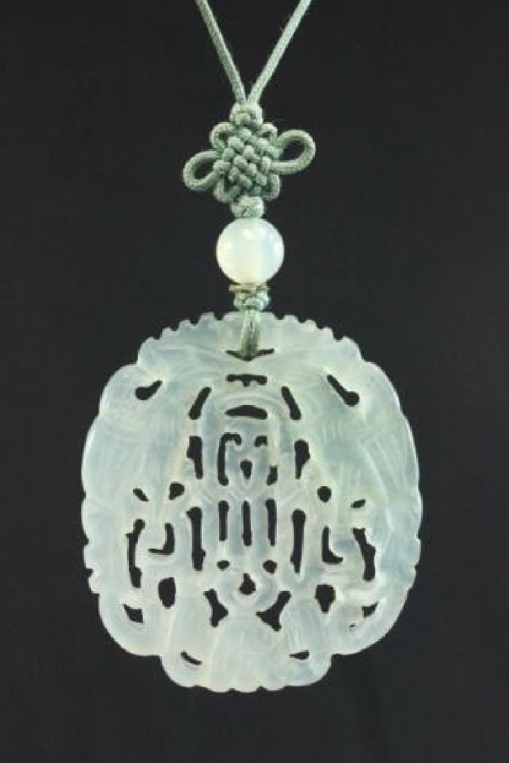 :Chinese Carved Jade Pendant: Approx. 2 1/2" H x 2" W. (5111)