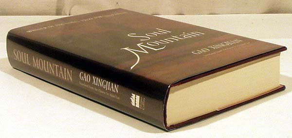 Xingjian SOUL MOUNTAIN 2000 Signed Nobel Prize: Title: Soul Mountain Author: Gao Xingjian Publisher: Harper Collins Publishers Printing Year: 2000 Signed first edition (later printing) Condition/Details: Bound in half cloth with bright gilt emb