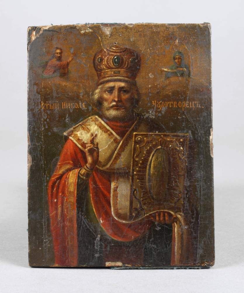 Reiseikone Heiliger Nikolaus: um 1900, kirchenslawisch bez., Tempera auf Holzplatte, frontale halbfigurige Darstellung des Heiligen Nikolaus von Myra, Schutzpatron Russlands, in reichem Inkarnat, die rechte Hand zum Segensgestus e