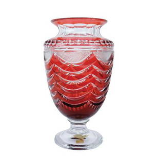 A Bohemian cranberry cut crystal vase: A Bohemian cranberry cut crystal vase