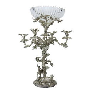 A silver-gilt epergne with a floral- patterned center: A silver-gilt epergne with a floral- patterned center piece