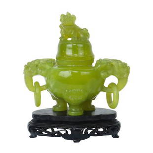 A Jade lion and foo dog censer: A Jade lion and foo dog censer