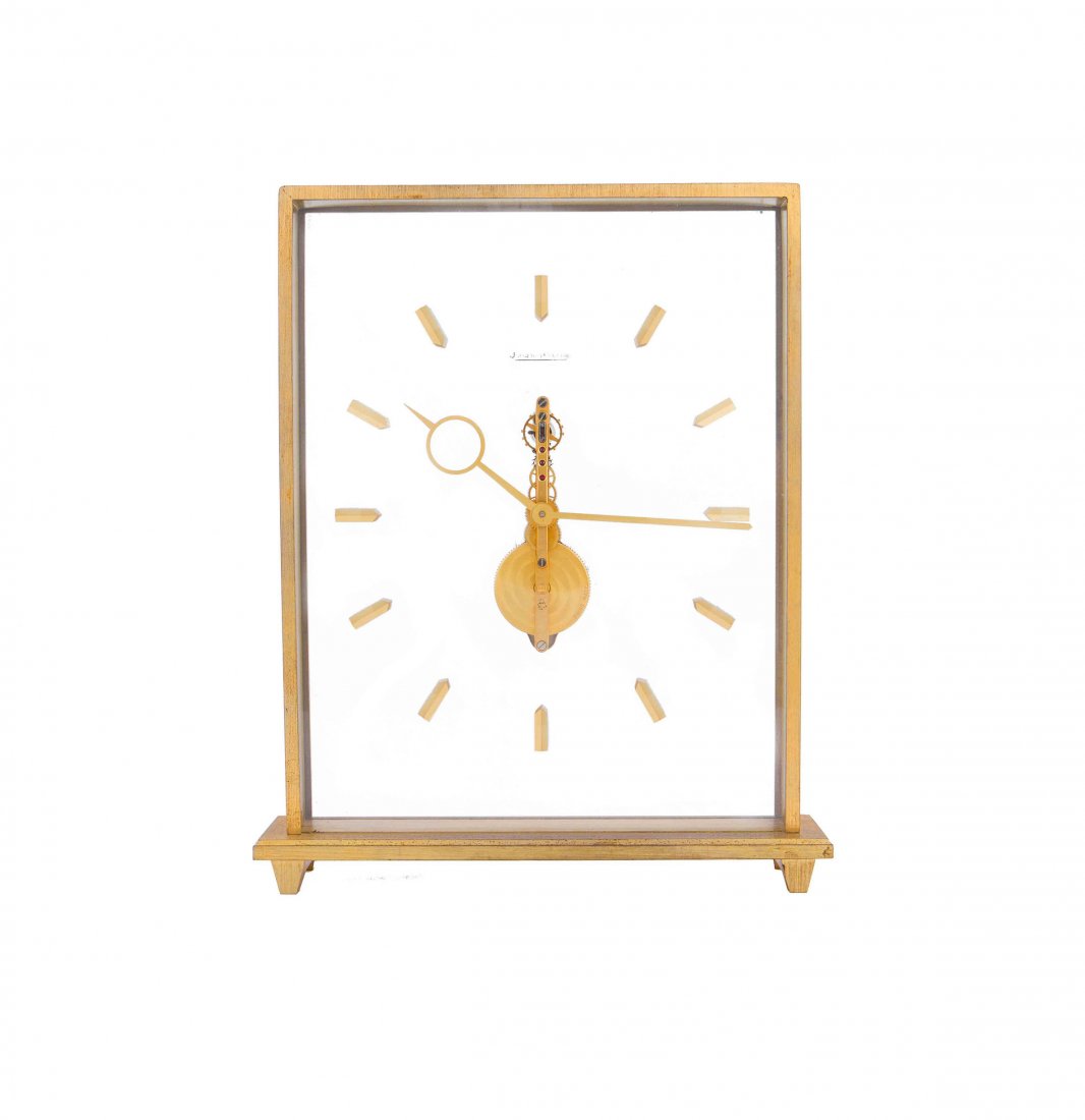 JAEGER LeCOULTRE - Inline Bridge Desk Clock: Acrylic with baton markers Brushed brass case with visible display