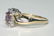 2161: 0.75 CT AMETHYST & DIA 2.30 GR 10K GOLD RING. - 2