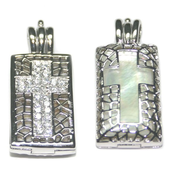 MOTHER-OF-PEARL & LAB SAPPH SILVER CROSS PENDANT.