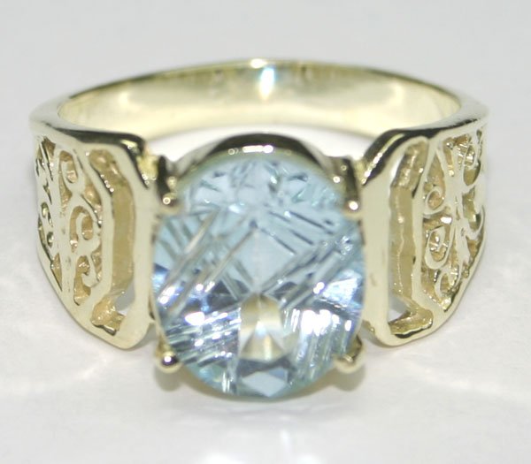 4.CT NATURAL B,TOPAZ SILVER RING.