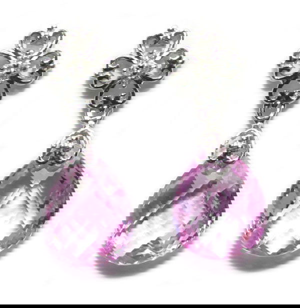 8 CT NATURAL DIA & P, TOPAZ 4 GR 10K GOLD EARRIN: THESE ARE A PAIR OF 10 KARAT WHITE GOLD NATURAL DIAMOND AND PINK TOPAZ EARRINGS .THEY WEIGHT 3.45 GRAMS AND CONTAINS 8 ROUND BRILLIANT NATURAL DIAMOND AND 2 NATURAL PINK TOPAZ 12 x 10 MM . THE EARRING