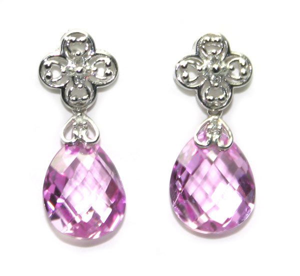 8 CT NATURAL DIA & P, TOPAZ 4 GR 10K GOLD EARRIN: THESE ARE A PAIR OF 10 KARAT WHITE GOLD NATURAL DIAMOND AND PINK TOPAZ EARRINGS .THEY WEIGHT 3.45 GRAMS AND CONTAINS 8 ROUND BRILLIANT NATURAL DIAMOND AND 2 NATURAL PINK TOPAZ 12 x 10 MM 8,CT . THE EA