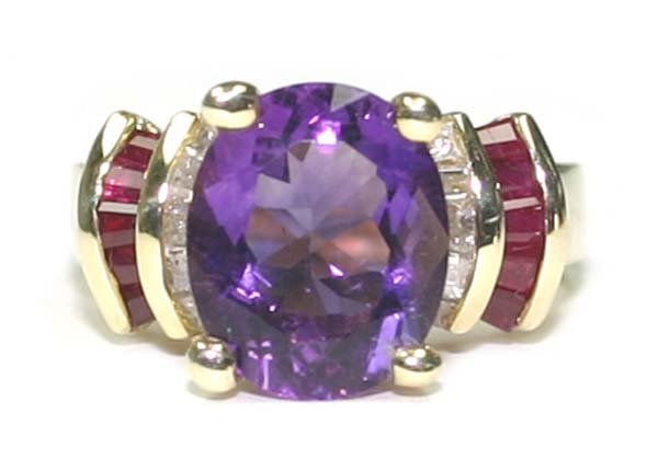5,CT DIAMOND-RUBY & AMETHYST 14KT GOLD RING .: THIS IS A 14 KARAT YELLOW GOLD NATURAL DIAMOND -RUBY AND AMETHYST RING IN TOTAL WEIGH OF 6.20 GRAMS ,IT CONTAINS A TOTAL OF 5,CT NATURAL DIAMOND BAGUETTE AND RUBY AND AN OVAL SHAPE AMETHYST IN THE CEN