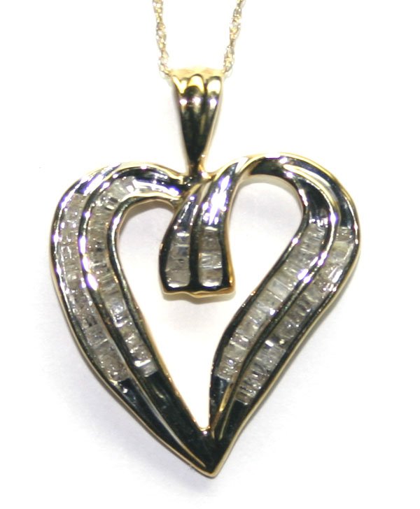 1.20CT DIA . 4G 10K Y/G PENDENT.