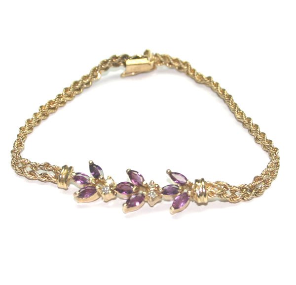 1.50 CT DIAMOND & TOURMALINE 14KT GOLD BRACELET.