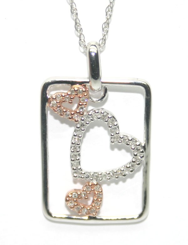 0.50 CT DIAMOND 10kt GOLD PENDANT .