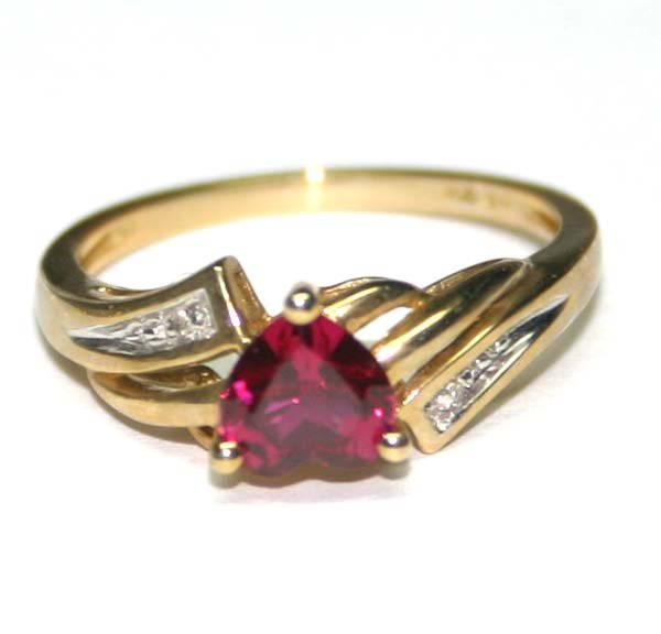 DIAMOND & LAB RUBY 10K GOLD RING .: THIS IS A 10 KARAT YELLOW GOLD NATURAL DIAMOND AND LAB CREATED RUBY RING IN TOTAL WEIGH OF 2.20 GRAMS , IT CONTAINS 2 SMALL ROUND SHAPE NATURAL DIAMOND AND A HEART SHAPE LAB CREATED RUBY 6x6 mm , THE
