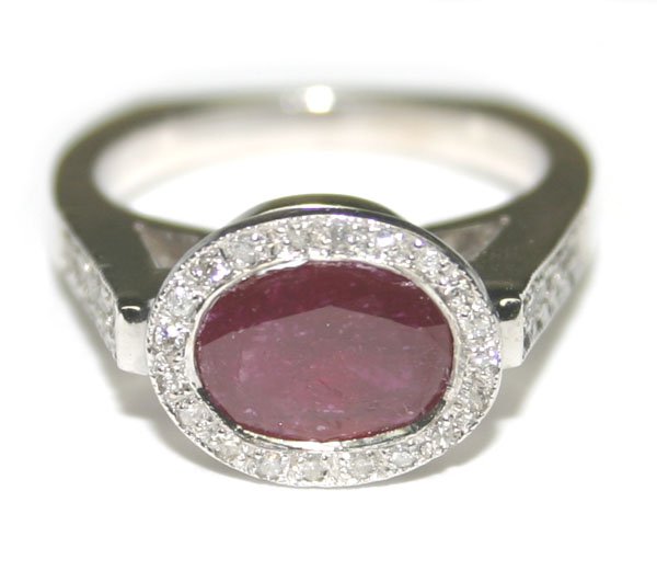 3.50 CT DIAMOND & RUBY 6.50 GR 14kt GOLD RING.