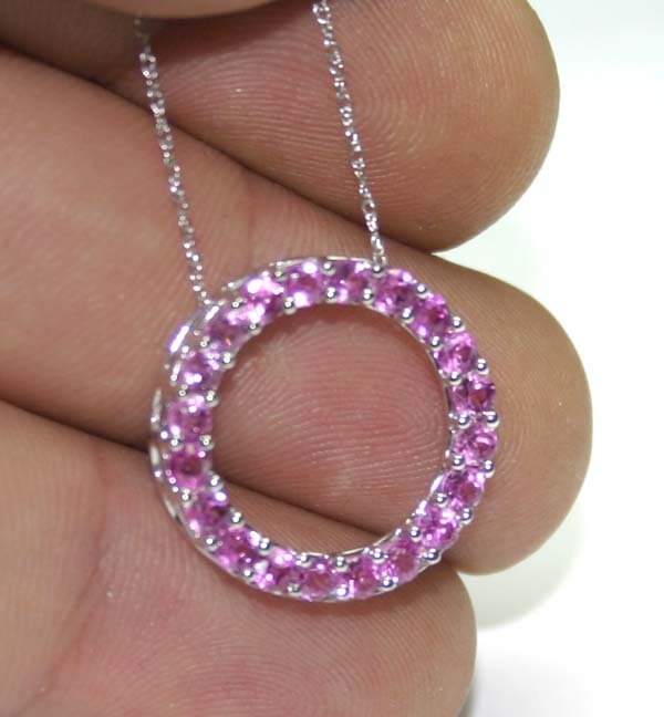 2,CT PINK TOPAZ 10K GOLD PENDANT .