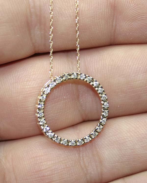0.70 CT DIAMOND 14K GOLD PENDANT .