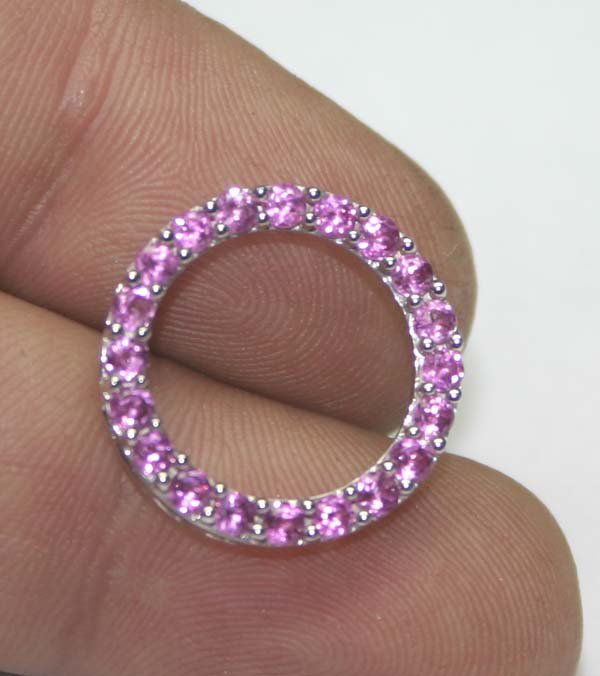 1,CT PINK TOPAZ 10K GOLD PENDANT .