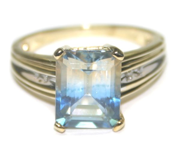 5,CT DIAM & B,TOPAZ 3.20 GR 10KT GOLD RING.