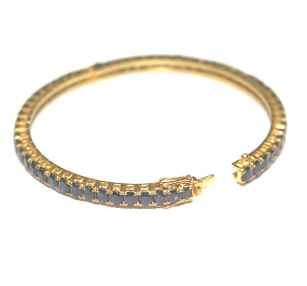 17 CT SAPPHIRE 14K GOLD BANGLE 12.10 GR .