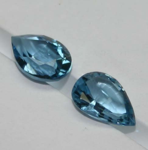 2, CT PAIR OF PEAR SHAPE BLUE TOPAZ .